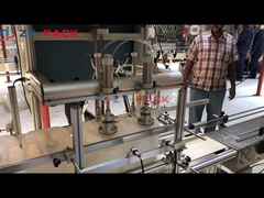 Машина для розлива пищевого масла в бочки 5-30 кг по весу нетто с укупорочной и этикетировочной машиной